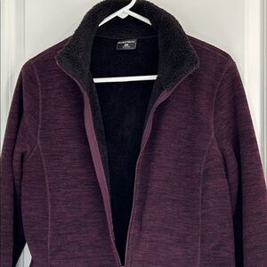 Purple Warm Jacket black sherpa lined and cuff trim. Good pre-owned condition.